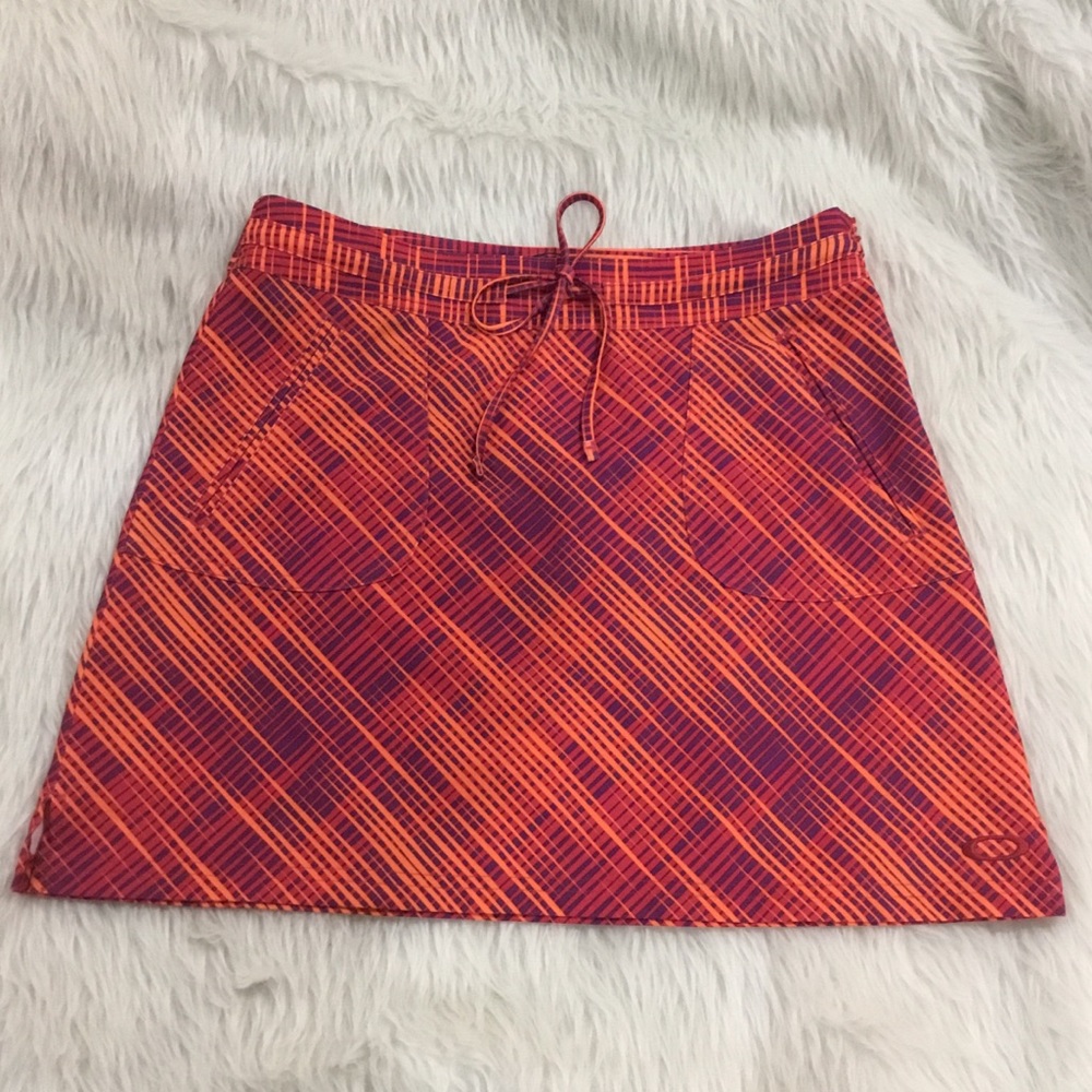 Oakley orange athletic tennis fitness outing skirt size 8